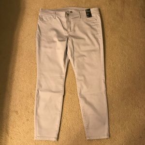 Tan slacks with a cool sheen.